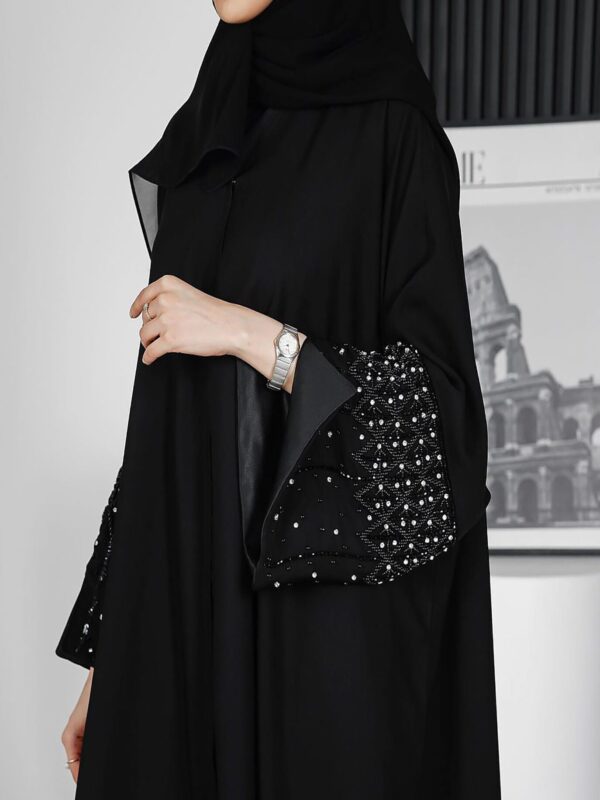 420997318_18303995785123321_5899895670182763474_n copy 4-10144 عباية شيهانة عملية تطريز كم عريض